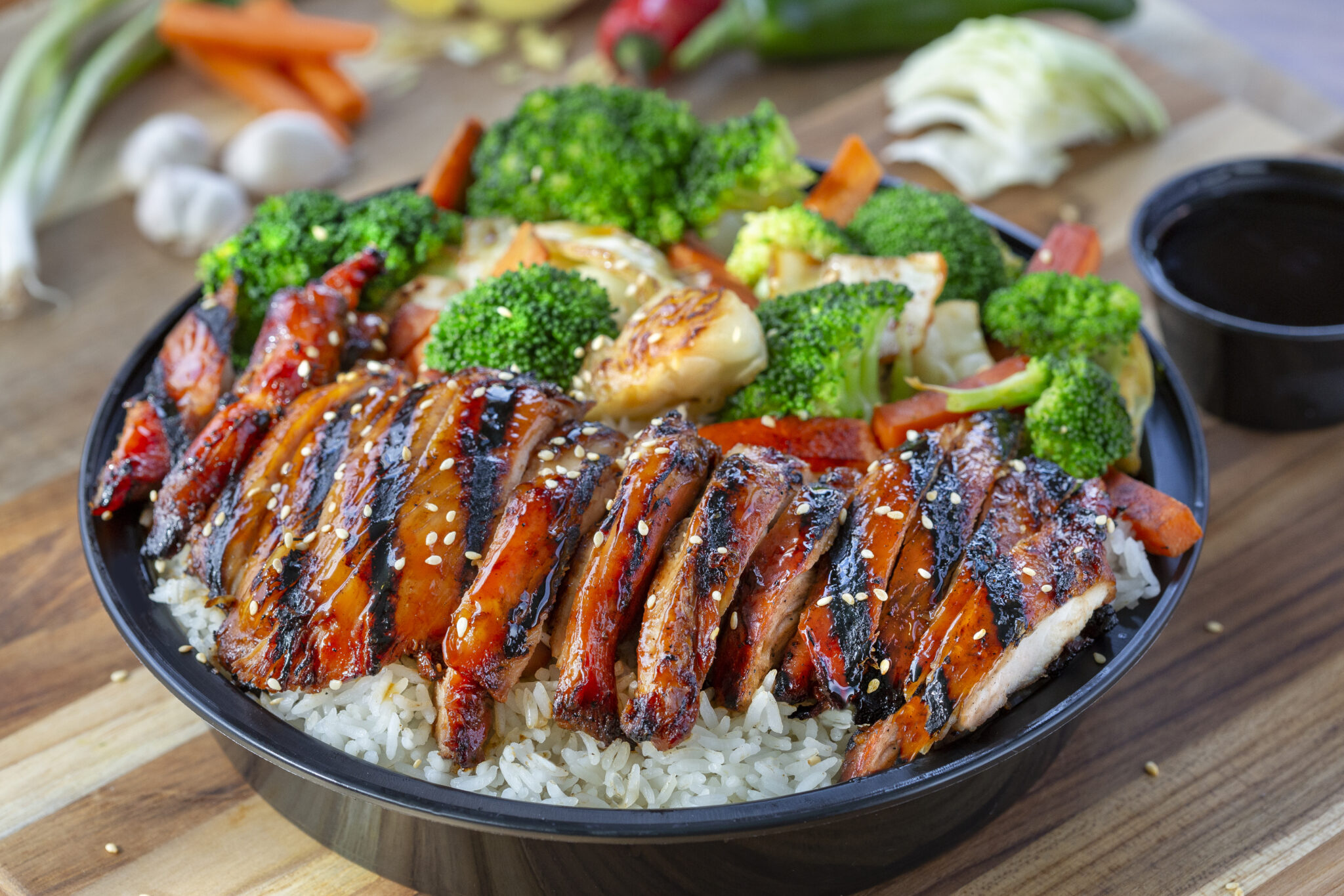 Chicken Teriyaki $14.99 Tender chicken, savory teriyaki sauce, crisp broccoli, carrots and cabbage served over fluffy white rice. 1.5 lbs of deliciousness!