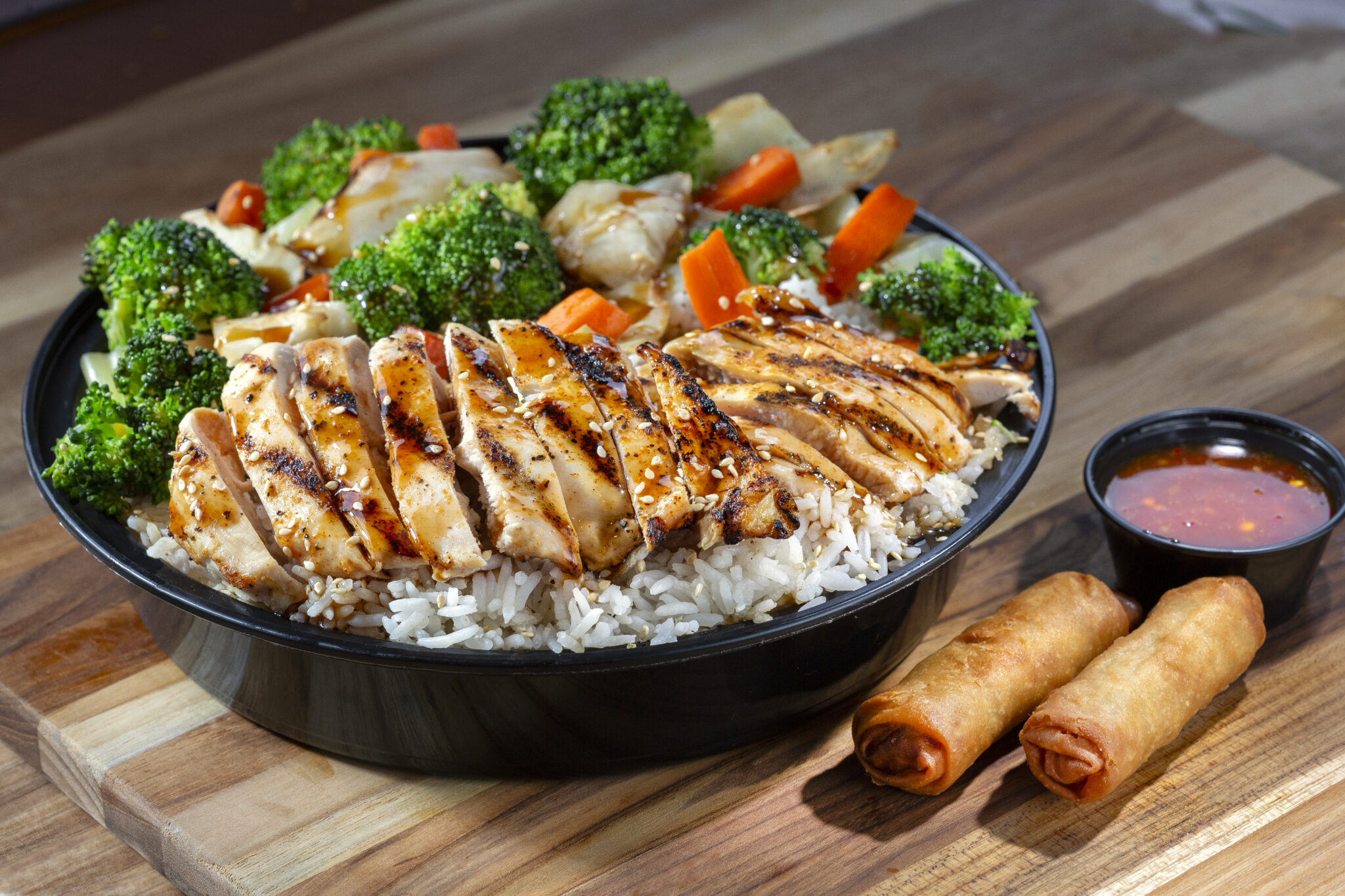 White Meat Chicken Teriyaki $17.99 Crispy chicken, savory teriyaki sauce, crisp broccoli, carrots and cabbage served over fluffy white rice. 1.5 lbs of deliciousness!